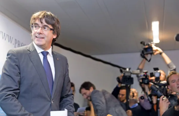 Carles Puigdemont od leta 2017 živi v Belgiji, v Italijo pa je 
odpotoval v vlogi evropskega poslanca.