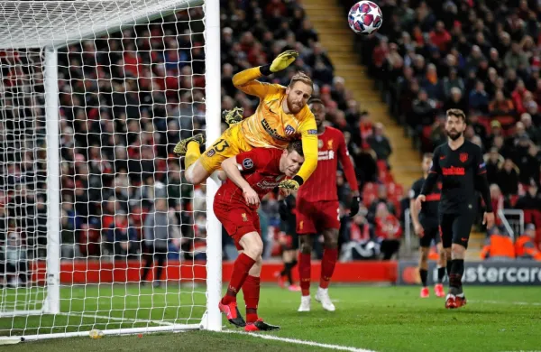 Jan Oblak (v rumenem) in soigralci iz Atletica bodo nocoj 
poskušali preskočiti visoko Liverpoolovo oviro. 