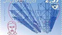Znamko s podobo Valentina Matije Živica in z njegovimi izumiteljskimi 
načrti  za helikopter je oblikoval Robert Žvokelj.