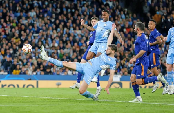 Manchester City (v svetlejših dresih) in Real sta v torek uprizorila 
spektakularno predstavo. 