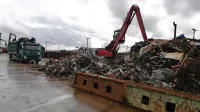 Krajani Koč opozarjajo, da je hrup ob pretovarjanju odpadnega železa resnično moteč.    