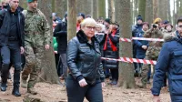 Predsednica Nataša Pirc Musar v vojaški jakni na prireditvi ob 80. 
obletnici padca pohorskega bataljona na Osankarici