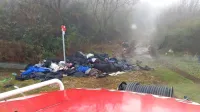 Večje  odlagališče  so   domači  gasilci  odkrili  med  pregledom  požarnih  poti.  