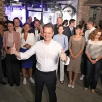 Zmaga SDS, a več glasov na levo sredino