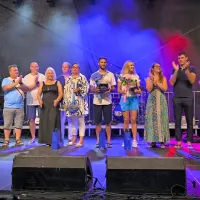 Sprejem izolskih olimpijcev -  veslačice Nine Kostanjšek in  jadralca Jakoba Božiča, rokometaša Boruta 
Mačkovška pa je zastopala mama. 