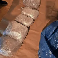  V preiskavi so zasegli deset kilogramov heroina in kilogram kokaina.