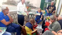 Barbara Vuga je predstavila svojo slikanico Lučka Tuintam na balkonu Vugove hiše, ki bo dobila nove vsebine. 