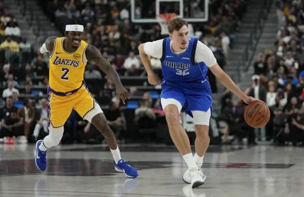 Oct 15, 2025; Las Vegas, Nevada, USA; Dallas Mavericks forward Cooper Flagg (32) dribbles the ball past Los Angeles Lakers forward Jarred Vanderbilt (2) during the first half at T-Mobile Arena.,Image: 1045869880, License: Rights-managed, Restrictions: *** Worldwide Rights Except Baltics, China, Denmark, Finland, Germany, Hong Kong, Japan, Macau, Norway, Poland, South Korea, Sweden, and Taiwan *** No sales outside your territory. No 3rd parties. No redistribution ***, Model Release: no, Credit line: Imagn Images/ddp USA/Profimedia