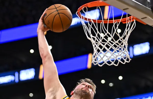 Apr 11, 2025; Los Angeles, California, USA; Los Angeles Lakers guard Luka Doncic (77) dunks against the Houston Rocketsduring the first half at Crypto.com Arena. Mandatory Credit: Jonathan Hui-Imagn Images
