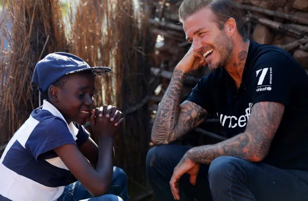 UNICEF Goodwill Ambassador David Beckham meets Sebenelle, 14, in Makhewu, Swaziland, on June 7, 2016, who receives the 7 Fund support in management of malnutrition in HIV positive children. Beckham travelled to Swaziland to see how 7: The David Beckham UNICEF Fund is helping UNICEF to provide life-saving treatment, care and support to HIV-positive children. During his visit Beckham learnt how the worst drought in decades &ndash; now taking hold on vast swathes of Eastern and Southern Africa &ndash; is threatening to wreak havoc on the lives of children and families already made vulnerable by HIV. Makhewu, Swaziland, June 7, 2016. &copy; UNICEF/Swaziland/Modola16