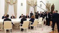 As Moscow prepares for possible negotiations with Washington aimed at ending its full-scale invasion of Ukraine, it is seeking a far more ambitious outcome than a mere ceasefire: a global reordering of spheres of influence. In the Kremlin's view, such an agreement would effectively mean U.S. recognition of Russian dominance in the post-Soviet space &mdash; including Ukraine &mdash; and, to some extent, an acknowledgment of its influence in Europe. To secure that goal, the Kremlin is now scouring for incentives it believes can catch and hold President Donald Trump's attention, ranging from rare earths deals and geopolitical leverage in Iran and North Korea to a long-dreamed-of Trump Tower in Moscow. Five current Russian government officials, including two diplomats, three sources close to the Kremlin and employees of three major state-owned companies confirmed this to The Moscow Times, all speaking on condition of anonymity due to the sensitivity of the matter. "The main thing is that they [the Americans] don't interfere in our affairs and don't tell us how to live," said a senior Russian official familiar with the Kremlin's negotiating logic. "That they don't hinder us in doing what we are doing." Some in Moscow also envision symbolic gestures of recognition as part of a potential agreement, such as President Vladimir Putin visiting Washington and meeting Trump in the White House. "If our boss [Putin] occasionally comes to Washington to meet with Trump &mdash; that would also be nice," a current government official said. Still, officials acknowledge that the era of major summits like those during the Cold War or the early post-Soviet years is over. "It's hard to count on that now," the government official said. Searching for leverage The Kremlin, recognizing the limitations of its negotiating position, has tasked officials and experts with analyzing and identifying all possible incentives that could grab Trump's interest and keep the talks from narrowing to a limited agenda,Image: 1056212593, License: Rights-managed, Restrictions:, Model Release: no, Credit line: American Photo Archive/Alamy/Profimedia