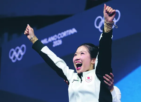 Veselje jJaponske umetnostne drsalke Ami Nakai, ki je osvojila bronasto medaljo.