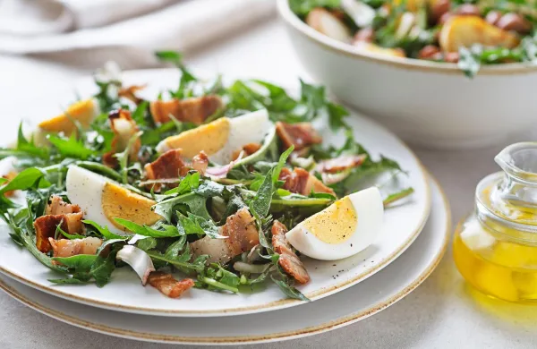 Dandelion salad with eggs and bacon close up,Image: 1012949825, License: Royalty-free, Restrictions:, Model Release: no, Credit line: zidi, Panther Media Global/Alamy/Profimedia