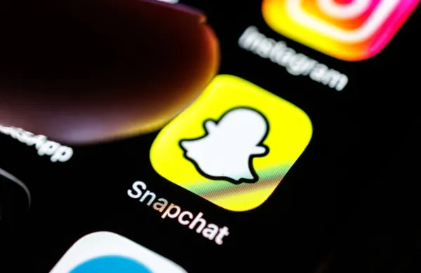 07 March 2026, Bavaria, Munich: The Snapchat app logo is seen on the display of a smartphone in Munich (Bavaria, Germany) on March 7, 2026, while a finger taps on the application's icon. Snapchat is a free instant messaging service that enables the private exchange of photos, videos and text messages and the publication of video clips. In 2016, the company Snapchat Inc. was renamed Snap Inc. (pointing finger, icon, symbol image, symbol photo, illustration, symbolic photo, illustrative photo, theme image, general image, theme photo) Photo: Matthias Balk/dpa,Image: 1081133170, License: Rights-managed, Restrictions: GERMANY OUT, Model Release: no, Credit line: MATTHIAS BALK/AFP/Profimedia
