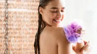 Girl Rubbing Body With Shower Gel Under Water Drops, Copy Space,Image: 1095376373, License: Royalty-free, Restrictions:, Model Release: no, Credit line: Prostock-studio/Alamy/Profimedia