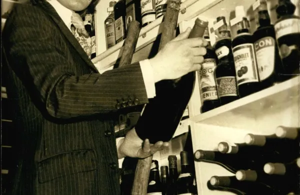 Mar. 07, 1972 - It's not impossible to find a Frenchman who sells whiskey in London, but the French public finds it funny and a bit odd to think that their wine seller is English. With a light British accent and a very British mustache, Steven Spurrier will surprise you with his knowledge of wine, equal to that of the best French sommeliers. He bought a quaint, little store on a street in the Quartier de la Madeleine. His clients are very satisfied with the exact taste of Spurrier, who does not push his customers to try whiskey, but who incites them to discover the charms, for example, of the latest beaujolais... Picture: Steven Spurrier in his store.,Image: 210089562, License: Rights-managed, Restrictions:, Model Release: no, Credit line: Keystone Pictures USA/Zuma Press/Profimedia