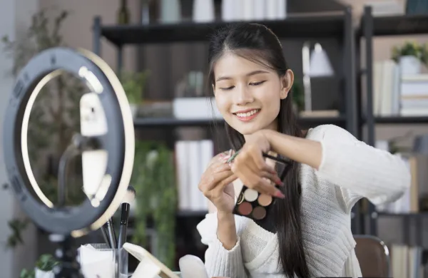 Beauty blogger Young Asian girl makeup artist Professional Woman blogger vlogger is showing cosmetics products with recording video Beauty influencer asian girl video online marketing live streaming,Image: 1022373389, License: Royalty-free, Restrictions:, Model Release: yes, Credit line: Sirijit Jongcharoenkulchai/imageBROKER/Profimedia