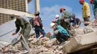 CARACAS - VENEZUELA - JUNE 25: Teams conduct debris removal work on a collapsed building after an earthquake in Caracas, Venezuela, on June 25, 2026. Diko Betancourt/Anadolu,Image: 1112442384, License: Rights-managed, Restrictions:, Model Release: no, Credit line: Diko Betancourt/AFP/Profimedia