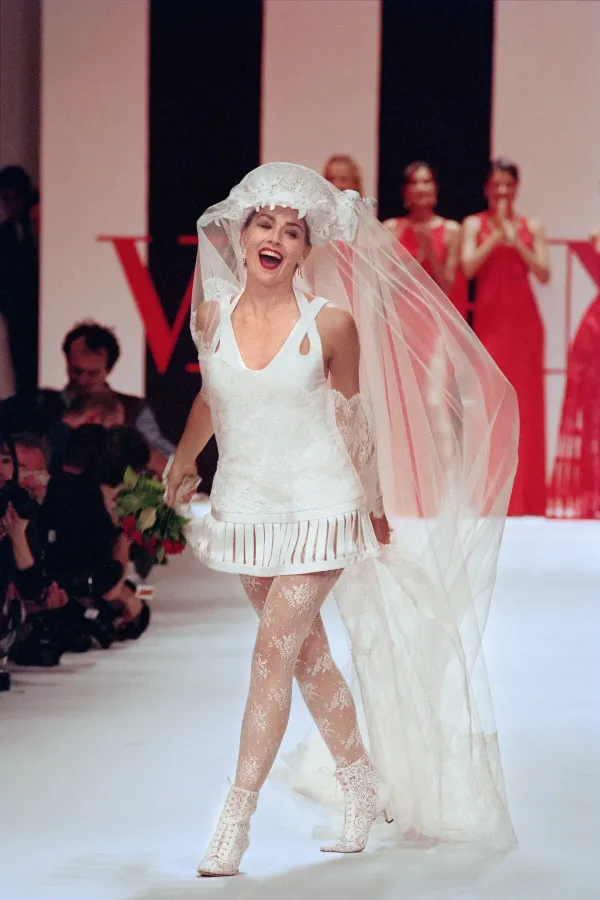 American actress Sharon Stone wears a wedding dress made by Italian fashion designer Valentino as part of his 1992 Spring/Summer ready to wear collection show on October 13, 1993 at Paris.,Image: 829411146, License: Rights-managed, Restrictions:, Model Release: no, Credit line: Gerard JULIEN/AFP/Profimedia