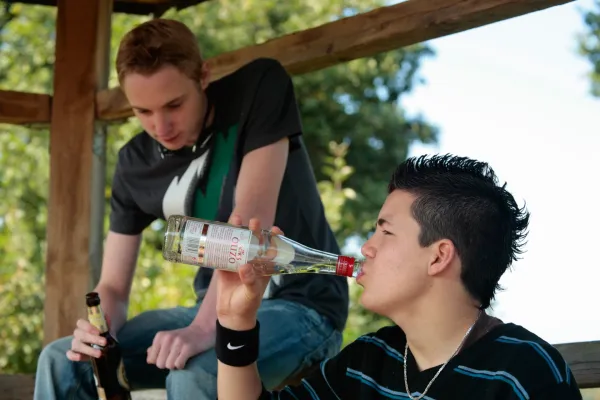 Two teenage boys drinking alcohol. The picture is being posed.,Image: 33933519, License: Rights-managed, Restrictions:, Model Release: yes, Credit line: Kuttig - People - 2/Alamy/Profimedia