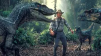 Sam Neill med velociraptorji v tretjem delu Jurskega parka.