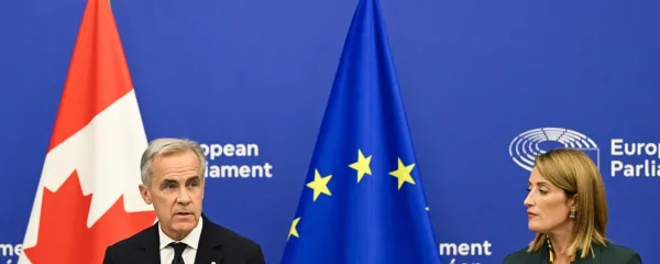 Canadian Prime Minister Mark Carney (L) delivers a speech next to European Parliament President Roberta Metsola in the hemicycle of the European Parliament in Strasbourg, eastern France, as part of a trip during which he welcomed a proposal by European Commission President for Canada to become the EU's first associate member, on September 17, 2026. Canadian Prime Minister Mark Carney on September 17, 2026, rejected threats by US President Donald Trump over Ottawa's push for closer ties with the European Union.,Image: 1135605333, License: Rights-managed, Restrictions:, Model Release: no, Credit line: Jean-Christophe VERHAEGEN/AFP/Profimedia