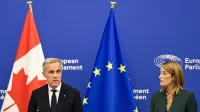 Canadian Prime Minister Mark Carney (L) delivers a speech next to European Parliament President Roberta Metsola in the hemicycle of the European Parliament in Strasbourg, eastern France, as part of a trip during which he welcomed a proposal by European Commission President for Canada to become the EU's first associate member, on September 17, 2026. Canadian Prime Minister Mark Carney on September 17, 2026, rejected threats by US President Donald Trump over Ottawa's push for closer ties with the European Union.,Image: 1135605333, License: Rights-managed, Restrictions:, Model Release: no, Credit line: Jean-Christophe VERHAEGEN/AFP/Profimedia