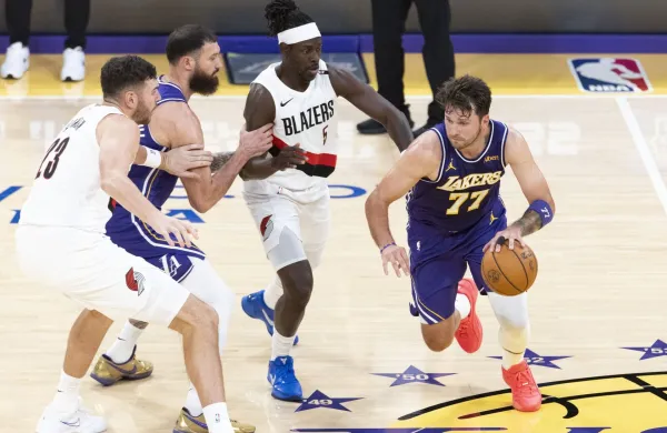 October 27, 2026, Los Angeles, California, USA: Los Angeles Lakers' Luka Don&Auml;i&Auml;&Dagger; (77) drives against the Portland Trail Blazers during an NBA basketball game on Tuesday, Oct. 27, 2026 in Los Angeles.,Image: 1147122066, License: Rights-managed, Restrictions:, Model Release: no, Credit line: Ringo Chiu/Zuma Press/Profimedia