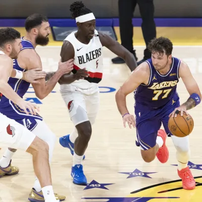 October 27, 2026, Los Angeles, California, USA: Los Angeles Lakers' Luka Don&Auml;i&Auml;&Dagger; (77) drives against the Portland Trail Blazers during an NBA basketball game on Tuesday, Oct. 27, 2026 in Los Angeles.,Image: 1147122066, License: Rights-managed, Restrictions:, Model Release: no, Credit line: Ringo Chiu/Zuma Press/Profimedia